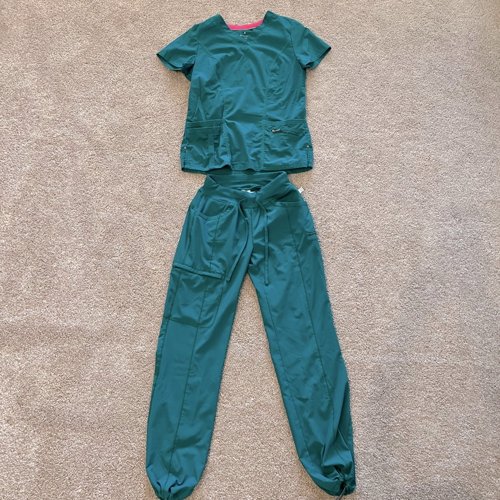 Scrubs! Pretty much brand new. Been in my closet for who knows how long😂
